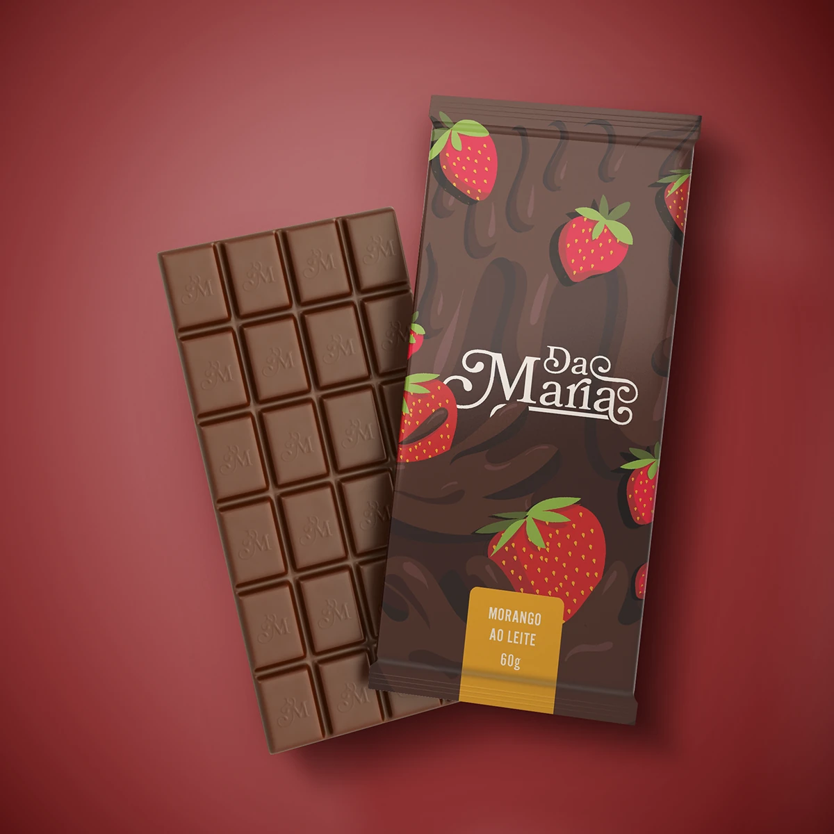 Embalagem Da Maria com ilustrações de morango ao lado de uma barra de chocolate