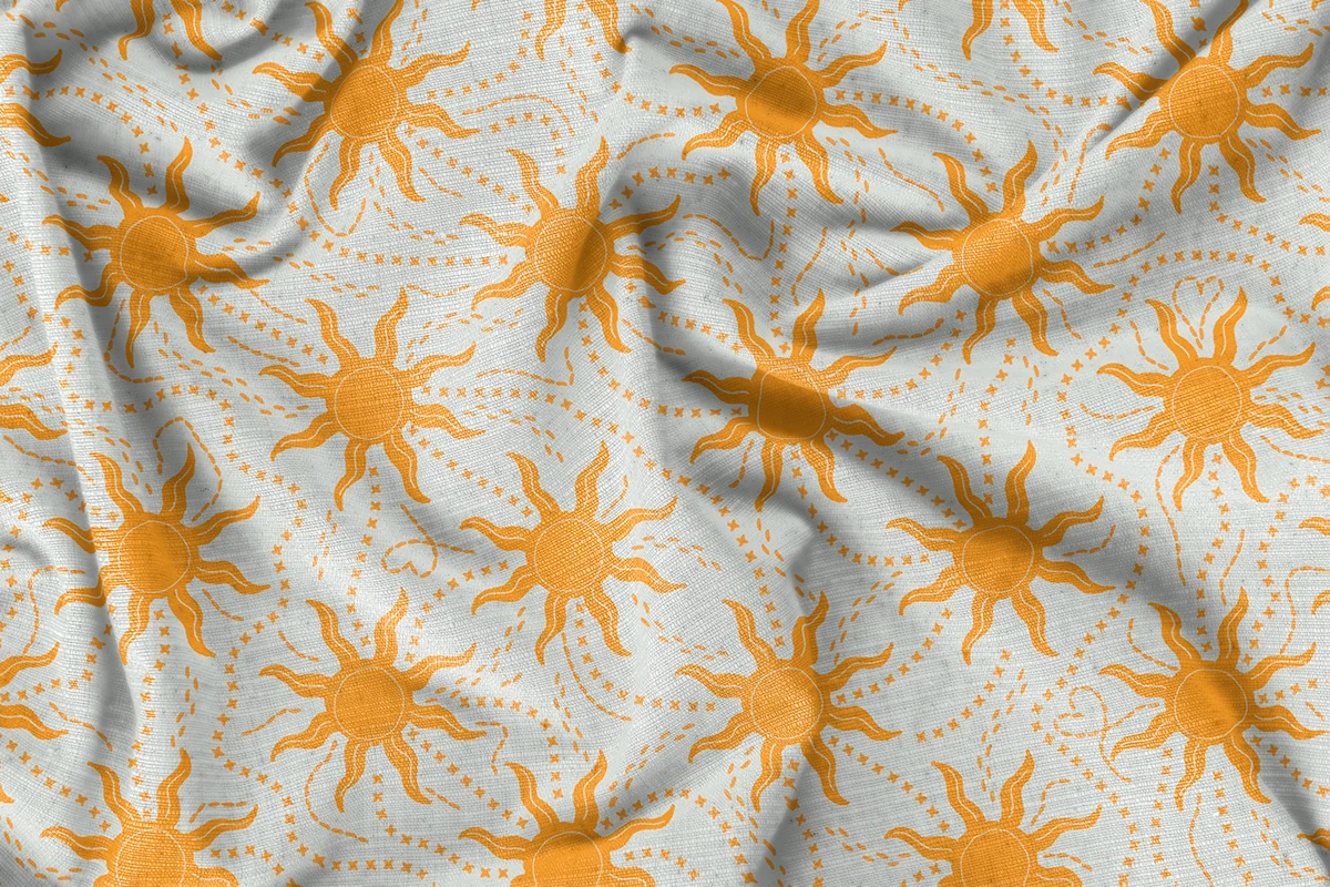 Detalhe do tecido com desenhos amarelos de sol — Lojas Objetiva